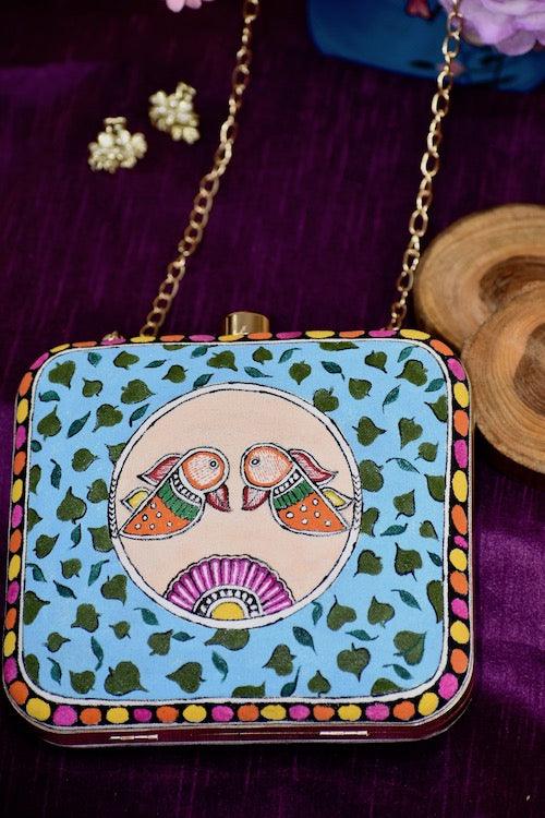 "Sacred Love: Radha Krishna Hand-Painted Clutch – A Divine Accessory"