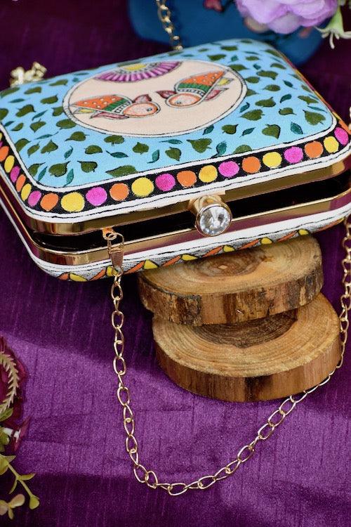 "Sacred Love: Radha Krishna Hand-Painted Clutch – A Divine Accessory"